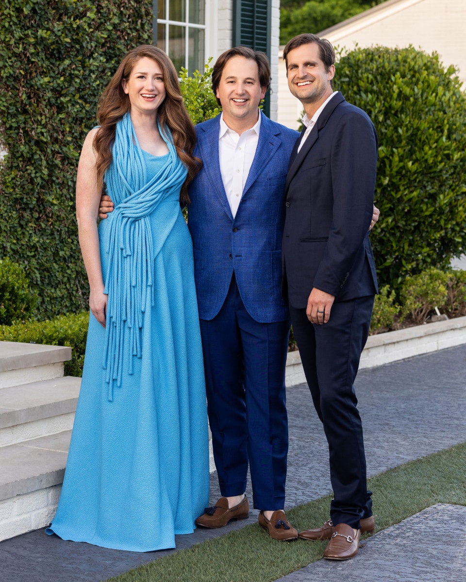 Photo of leadership team in front of studio