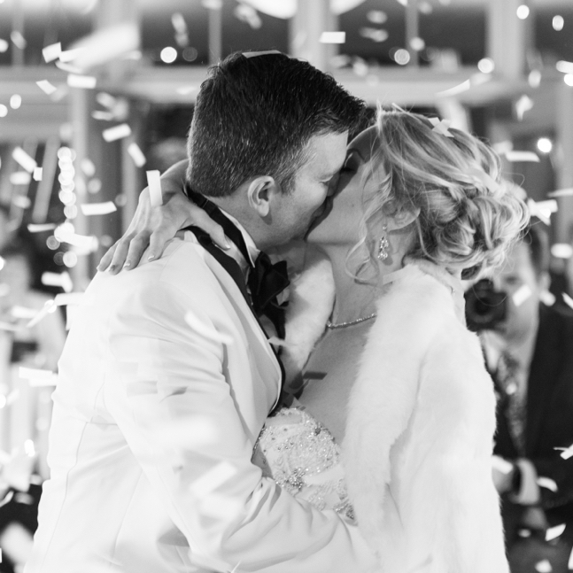 Bride and Groom kissing at ceremony