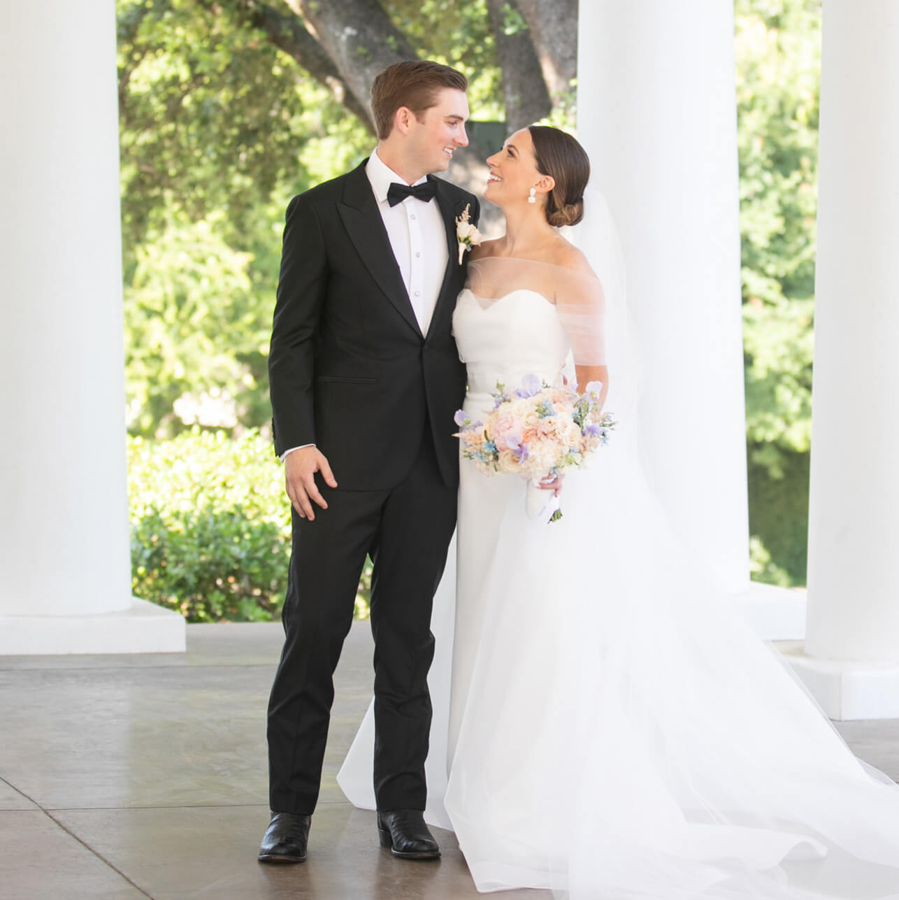 Bride and groom gazing into each others eyes before the ceremony
