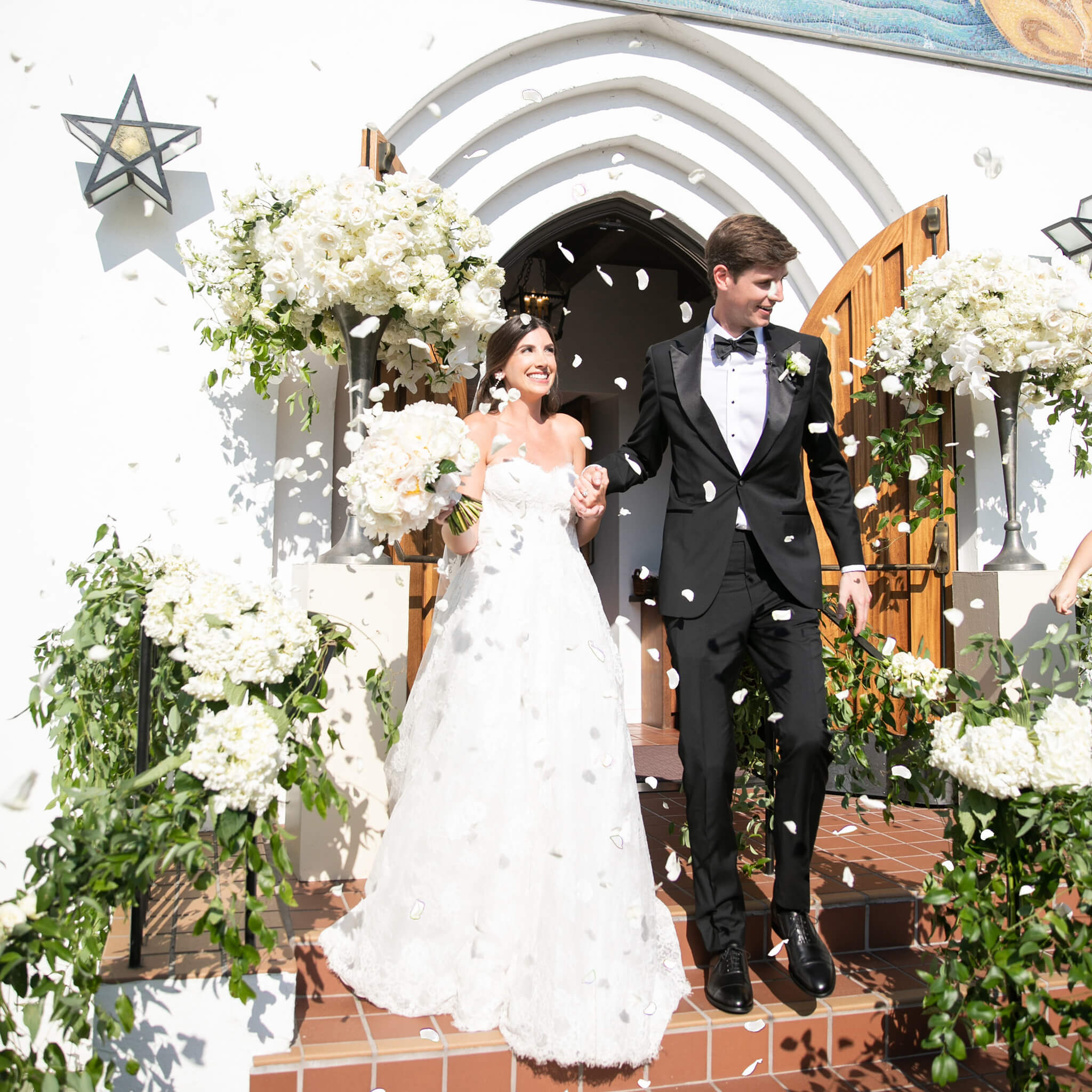 Bride and groom walking out from ceremony