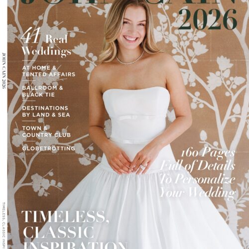Cover of 2026 John Cain Magazine with bride standing in front of brown and white wall
